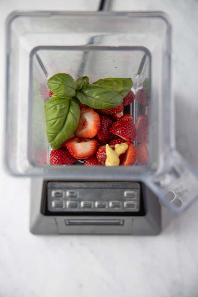 strawberry basil dressing ingredients in a blender