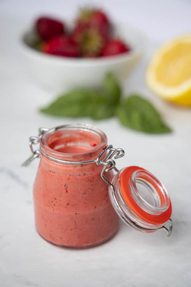 small jar of strawberry basil dressing