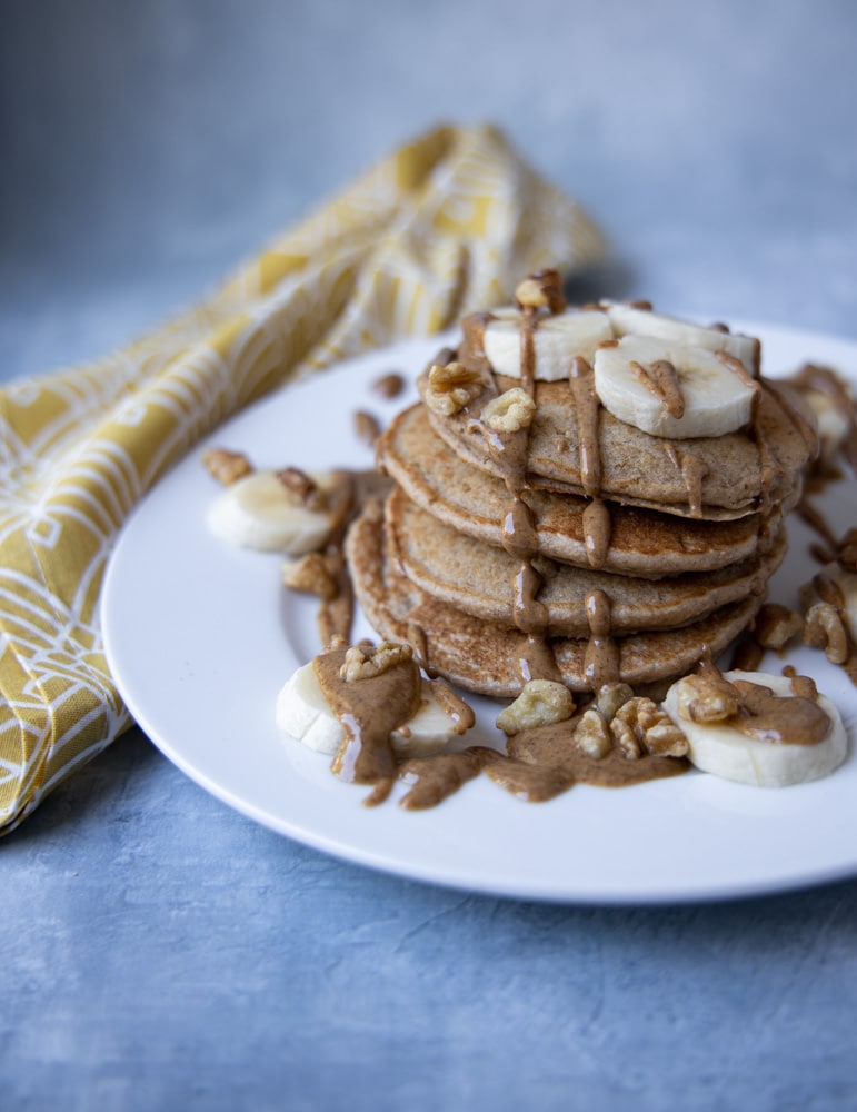 stack of banana pancakes on a plate