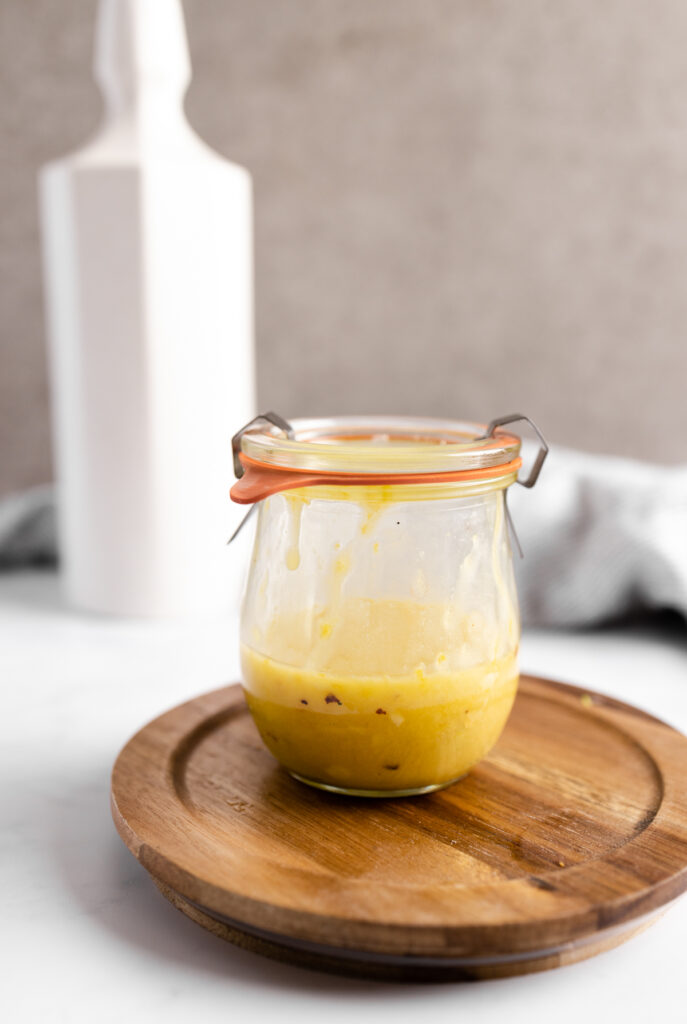 Lemon garlic dressing in a jar.