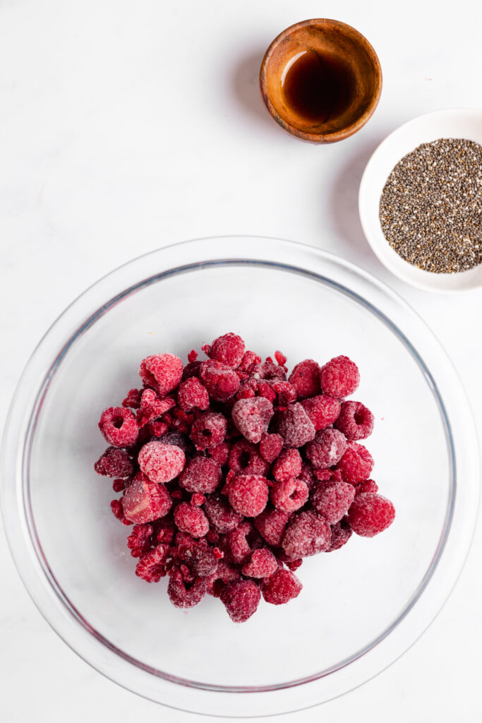 Bowl of frozen raspberries.