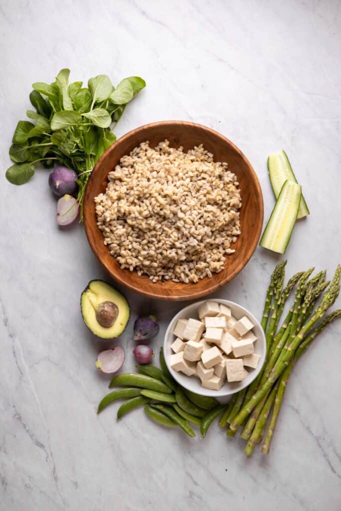 ingredients in bowls for the spring grain bowl