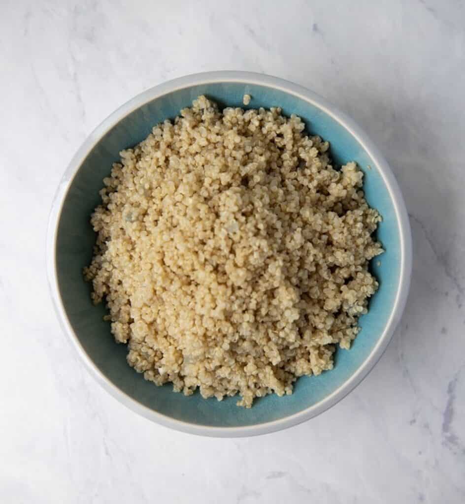 fluffy quinoa in a blue bowl