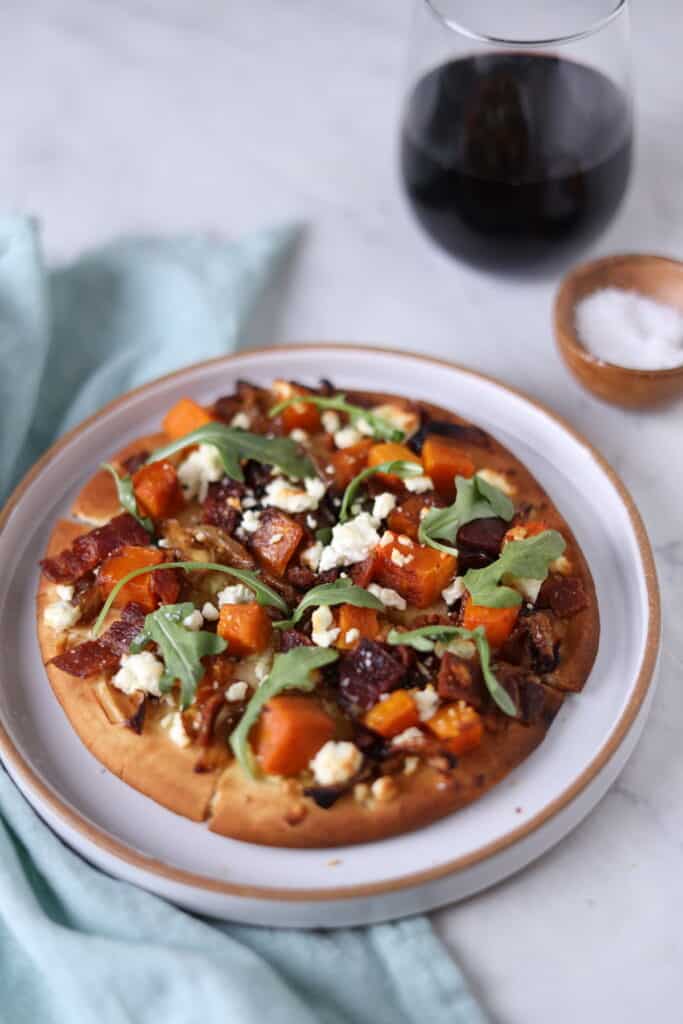 flatbread topped with bacon, squash, caramelized onion and goat cheese