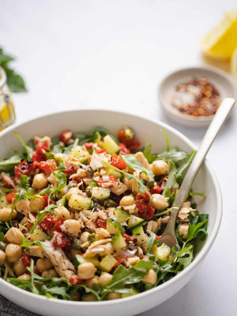 Meditarranean tuna salad in a white bowl.